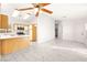 Open-concept living room features tile floors that flow seamlessly into the kitchen at 6653 Lund Dr, Las Vegas, NV 89108