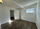 Bright bedroom with new hard wood floors and ample natural light at 712 Harvard St, Las Vegas, NV 89107