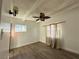 Cozy bedroom featuring new wood flooring and a ceiling fan, creating a welcoming and relaxing atmosphere at 712 Harvard St, Las Vegas, NV 89107