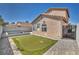 A well-kept putting green and privacy wall add leisure and seclusion to this backyard at 7308 Alpine Ridge St, Las Vegas, NV 89131