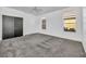 Bedroom with plush carpet, a ceiling fan, and a closet at 7308 Alpine Ridge St, Las Vegas, NV 89131