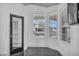 Bright kitchen nook with large windows offering a view of the neighborhood at 7308 Alpine Ridge St, Las Vegas, NV 89131