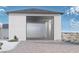 Spacious, modern garage with ample room for vehicles and storage, showcasing the home's functionality and design at 7485 Torino Ave, Las Vegas, NV 89113