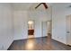 Bedroom with wood floors and ensuite bathroom, showing the sink and mirror at 8301 Boseck Dr # 215, Las Vegas, NV 89145