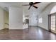 Open floor plan with wood floors and access to back yard patio at 8301 Boseck Dr # 215, Las Vegas, NV 89145