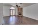 Bright living room boasting elegant floors, stone fireplace, high ceilings, and plenty of natural light at 8301 Boseck Dr # 215, Las Vegas, NV 89145