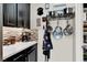 Kitchen detail showing stainless steel pans, cook books, and a coffee maker at 920 Claystone Ridge Ave, North Las Vegas, NV 89084