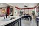 A combined kitchen and dining area with a breakfast bar and a table for Gathering gatherings at 920 Claystone Ridge Ave, North Las Vegas, NV 89084