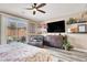 Bright main bedroom with sliding door to the backyard at 920 Claystone Ridge Ave, North Las Vegas, NV 89084