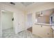 Hallway featuring tile floors, leading to other rooms in the house at 9421 Gold Mountain Dr, Las Vegas, NV 89134