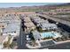 An elevated shot showcasing the community pool and well-maintained residential buildings in a desirable neighborhood at 965 Nevada State Dr # 39201, Henderson, NV 89002