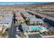 An elevated shot showcasing the community pool and well-maintained residential buildings in a desirable neighborhood at 965 Nevada State Dr # 39201, Henderson, NV 89002