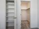 Walk-in closet with shelves and space for hanging clothes at 965 Nevada State Dr # 39201, Henderson, NV 89002