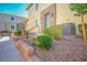 Charming townhome featuring a welcoming entrance and well-maintained landscaping at 965 Nevada State Dr # 39201, Henderson, NV 89002