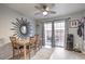 Bright dining room features a sliding glass door to the patio, connecting indoor and outdoor living spaces at 9655 Idle Spurs Dr, Las Vegas, NV 89123