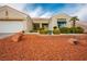 Charming one-story home with a desert-landscaped front yard and two-car garage at 10320 Bent Brook Pl, Las Vegas, NV 89134