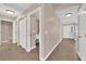 Hallway with tile flooring and ample storage space at 104 Hutton Ln, Las Vegas, NV 89145