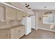 Bright eat-in kitchen with tile floors and plenty of cabinet space at 104 Hutton Ln, Las Vegas, NV 89145