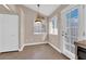 Kitchen nook area featuring tile flooring, storage closet, and exterior access at 104 Hutton Ln, Las Vegas, NV 89145