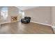 Bright living room with a fireplace, wood floors, and an abundance of natural light at 104 Hutton Ln, Las Vegas, NV 89145