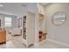 Inviting entryway with coat closet and storage cabinets at 10564 Tranquil Glade Ln, Las Vegas, NV 89135