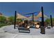 Community playground with slides and shade structures for sunny outdoor fun with Gathering and friends at 10564 Tranquil Glade Ln, Las Vegas, NV 89135