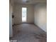 Bright living room with a window, neutral wall paint and carpet flooring at 1405 Vegas Valley Dr # 360, Las Vegas, NV 89169