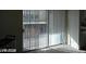 Sliding glass door that leads to a yard at 1405 Vegas Valley Dr # 360, Las Vegas, NV 89169