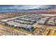 An aerial shot of the community showcasing the neighborhood and surrounding mountains at 144 Sarabeth St, Las Vegas, NV 89138