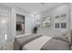 Cozy bedroom featuring shutters, closet, and artwork for a tranquil and modern ambiance at 144 Sarabeth St, Las Vegas, NV 89138