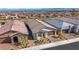 Beautiful home in a planned community with desert landscaping, a tile roof and a paver driveway at 144 Sarabeth St, Las Vegas, NV 89138