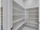 Large walk-in pantry featuring custom shelving to organize storage and dry goods at 144 Sarabeth St, Las Vegas, NV 89138