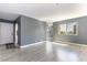 Inviting living room with gray walls and a view through the window at 1844 N Decatur Blvd # 203, Las Vegas, NV 89108