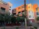 Modern apartment complex featuring balconies, updated paint and desert landscaping at 19 E Agate Ave # 406, Las Vegas, NV 89123