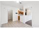 Hallway leads to the kitchen with tile flooring and neutral paint palette at 1911 Hobson Dr, Henderson, NV 89074