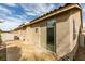 Cozy backyard with a concrete patio, ideal for entertaining or enjoying the desert landscape at 205 Crown Imperial St, Henderson, NV 89074