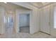 Open entryway with tile flooring, leading to bedrooms and living areas at 205 Crown Imperial St, Henderson, NV 89074