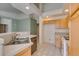 Well-lit kitchen with stainless steel sink, ample counter space, and modern appliances at 205 Crown Imperial St, Henderson, NV 89074