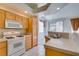 Well-equipped kitchen featuring stainless appliances, ample countertop space, and natural light at 205 Crown Imperial St, Henderson, NV 89074