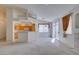 Bright living room featuring neutral colors, high ceilings, and sliding door access to the patio at 205 Crown Imperial St, Henderson, NV 89074