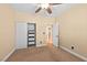 Bedroom with carpeting, ceiling fan, and a closet with adjustable storage at 2213 Midvale Ter, Henderson, NV 89074