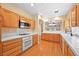 Kitchen featuring stainless steel appliances and white tile countertops at 2213 Midvale Ter, Henderson, NV 89074