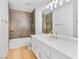 Bathroom with a white vanity and tile backsplash, and gold fixtures at 2620 San Martin Ct, Las Vegas, NV 89121