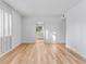 Bright, airy bedroom with sleek wood floors, plantation shutters, and mirror closet doors at 2620 San Martin Ct, Las Vegas, NV 89121