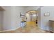 Elegant foyer with tile flooring, neutral walls, and arched doorways at 2713 Tanagrine Dr, North Las Vegas, NV 89084