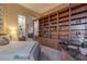 Bedroom with carpet, built-in bookshelf, desk and art at 2747 Paradise Rd # Ph 3604, Las Vegas, NV 89109