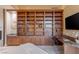 Bedroom with carpet, built-in bookshelf, desk and art at 2747 Paradise Rd # Ph 3604, Las Vegas, NV 89109