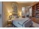 Bedroom with carpet, built-in bookshelf, desk and art at 2747 Paradise Rd # Ph 3604, Las Vegas, NV 89109