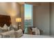 Comfortable bedroom with an incredible view of the city and mountains through the floor to ceiling windows at 2747 Paradise Rd # Ph 3604, Las Vegas, NV 89109