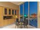 Cozy dining area with city views, perfect for intimate meals and showcasing modern cabinetry and design at 2747 Paradise Rd # Ph 3604, Las Vegas, NV 89109
